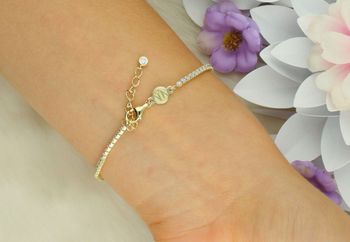 Bransoletka tenisowa Nomination Italy z kolekcji Petit Sparkle. Srebro 925 pozłacane 18K złotem, zdobiona cyrkoniami. Regulowana długość 16,5–19,5 cm. Oryginalna biżuteria idealna na prezent! (1).jpg